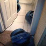 water damage at toilet ServiceMaster by Wright